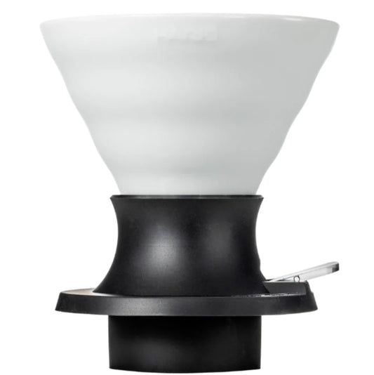 White coffee filter with black base on a white background